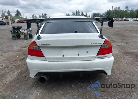 1998 Mitsubishi Lancer z USA, uszkodzony, nr VIN CP9A0003723